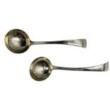 Pair of Edwardian silver sauce ladles engraved with initials London 1909 MakerJosiah Williams & Co