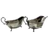 Pair of silver sauce boats with loop handles on triple shaped supports Glasgow 1913 Maker Robert Sco