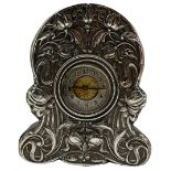 Leather and silver mounted timepiece of Art Nouveau design with raised pattern of stylised flowers a