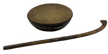 Hardwood tambourine with ray skin panel and an Indian stick with wire wound decoration