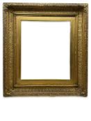 Frame - early 20th century stepped gilt frame with foliate design and scrolled fleur-de-lis corners