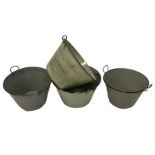 Four painted metal buckets with carrying handles