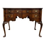 Queen Anne style serpentine walnut writing table