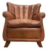 Club armchair upholstered in tan leather