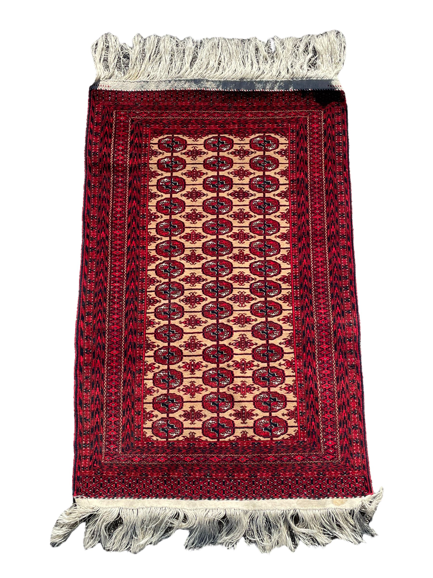 Persian Tekke Bokhara red ground rug