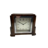English walnut cased 8-day mantle clock with a square chrome bezel