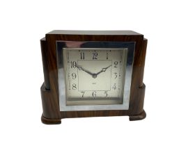 English walnut cased 8-day mantle clock with a square chrome bezel