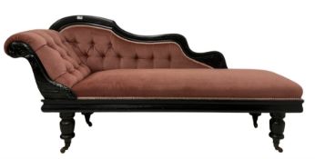 Victorian chaise longue in buttoned upholstery on ebonised frame