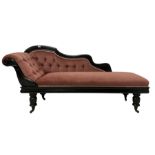 Victorian chaise longue in buttoned upholstery on ebonised frame