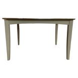 Light oak drawer leaf extending dining table