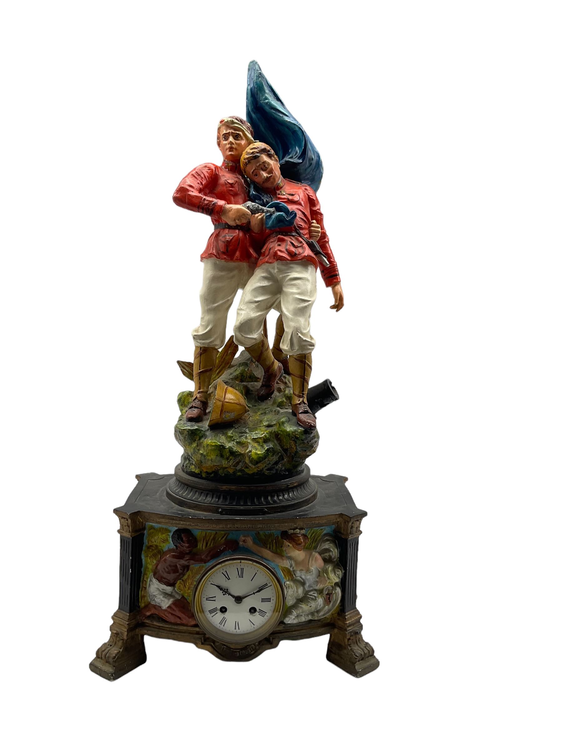 Spelter cased mantle clock with a French striking movement c1905