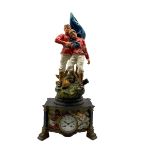Spelter cased mantle clock with a French striking movement c1905