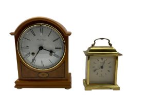 Two 20th century mantle clocks. A light maple wooden cased 8-day mantle clock and a quartz carriage