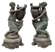 Pair statues of Classical Greek maidens holding amphorae urns with a bronzed finish