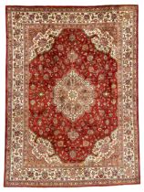 Persian Meshed golden red ground carpet