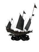 Chinese white metal Junk ship on carved wooden stand