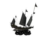 Chinese white metal Junk ship on carved wooden stand
