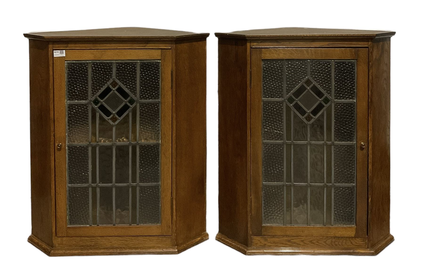 Pair oak corner cabinets