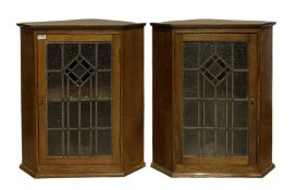 Pair oak corner cabinets