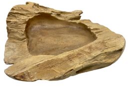 Carved wooden bowl of natural form