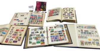 Five stamp albums and contents of GB and World stamps and a few coins