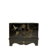 Black lacquered chest on a stand