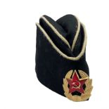 Russian military side cap with enamel and gilt metal badge