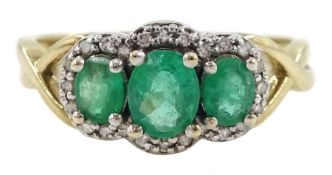 9ct gold three stone oval emerald and diamond cluster ring