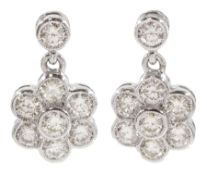 Pair of 18ct white gold milgrain set round brilliant cut diamond daisy cluster stud earrings