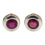 Pair of silver and 14ct gold wire ruby stud earrings