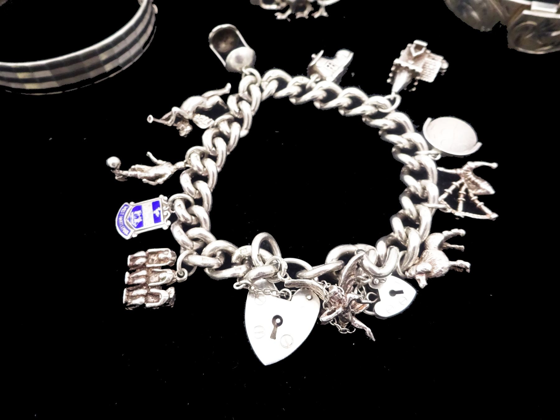 Silver jewellery including curb link bracelet with heart locket clasp and eleven charms including po - Image 2 of 3