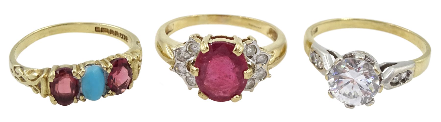 Gold oval ruby and cubic zirconia cluster ring