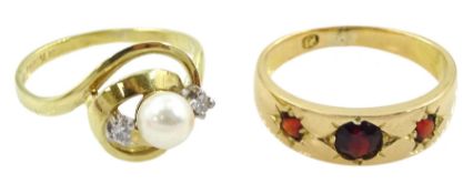 Early 20th century 18ct gold gypsy set three stone garnet ring and a 14ct gold pearl and diamond rin