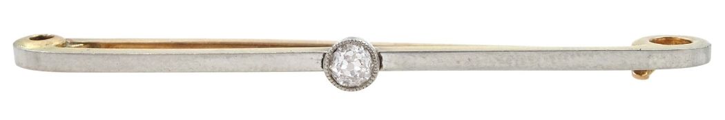 Early 20th century platinum and 15ct gold milgrain set single stone diamond brooch