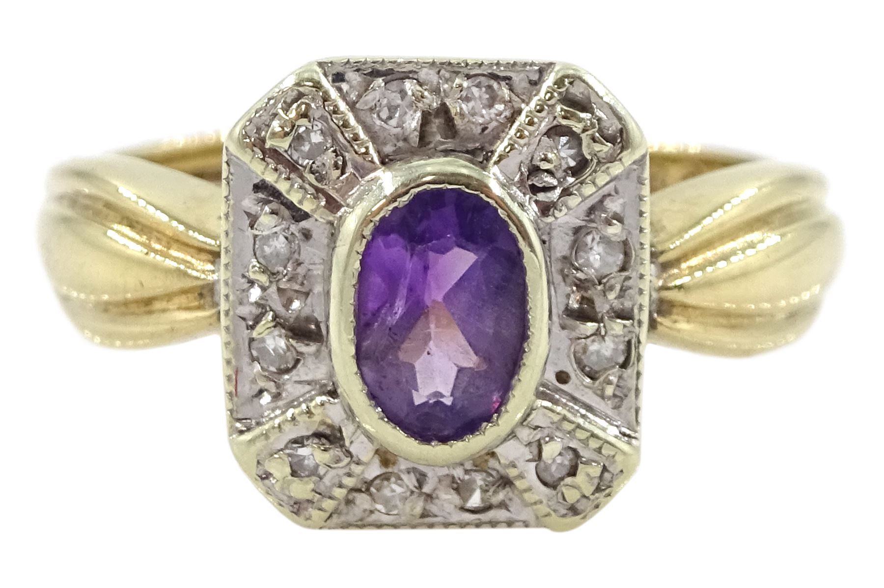 Gold oval amethyst and diamond cluster ring