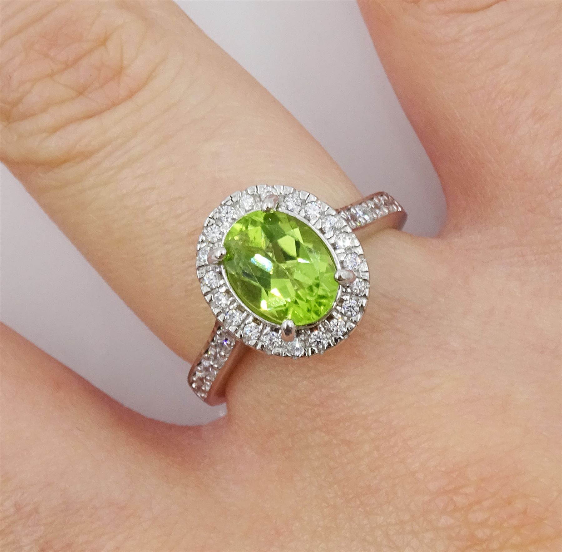 Silver oval peridot and cubic zirconia ring - Image 2 of 4