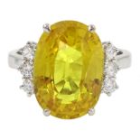 18ct white gold oval yellow sapphire and six stone round brilliant cut diamond cluster ring