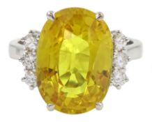 18ct white gold oval yellow sapphire and six stone round brilliant cut diamond cluster ring