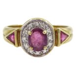 Gold oval ruby and diamond chip cluster ring