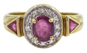 Gold oval ruby and diamond chip cluster ring