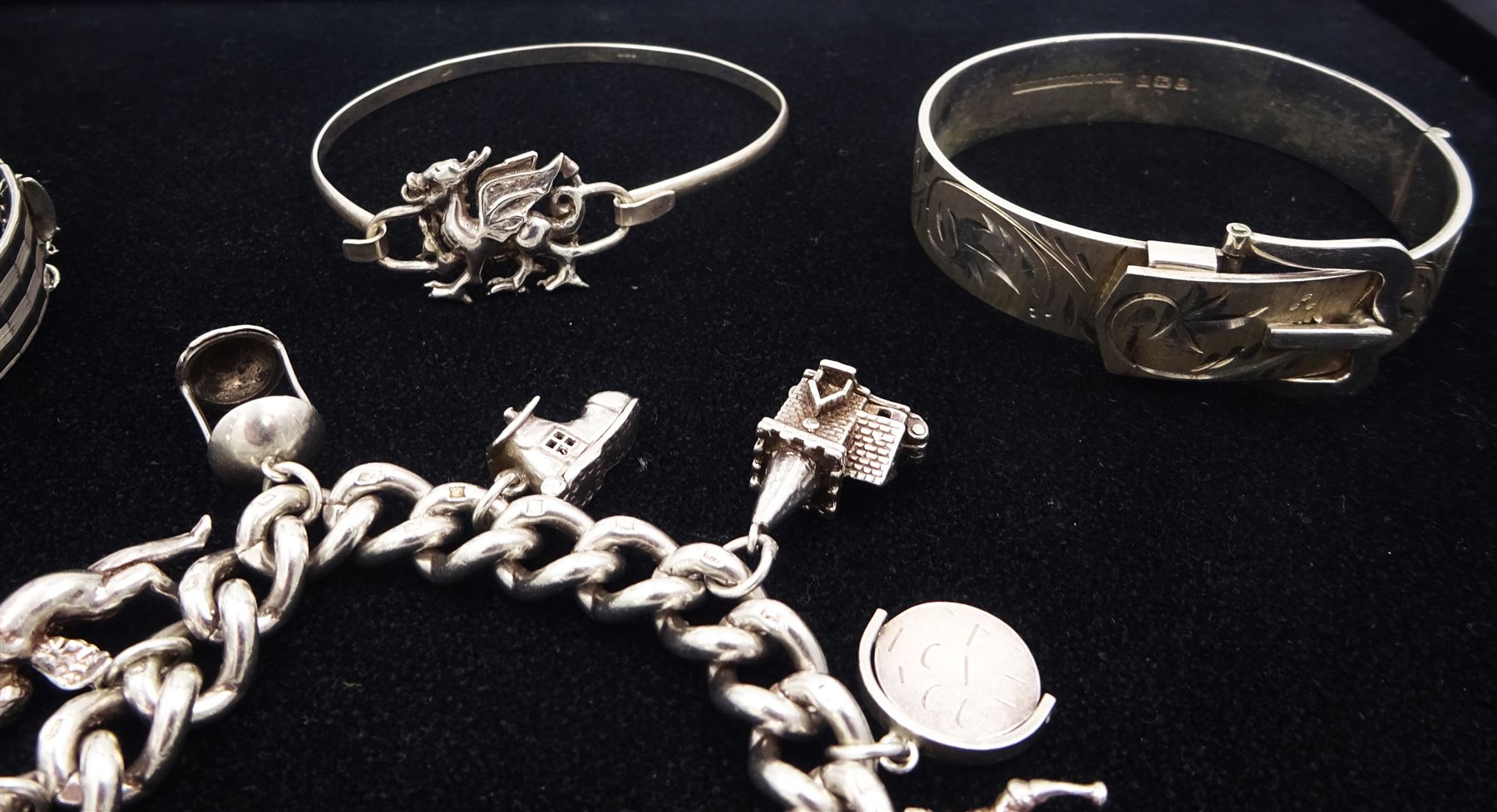 Silver jewellery including curb link bracelet with heart locket clasp and eleven charms including po - Image 3 of 3