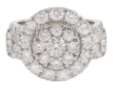 White gold round brilliant cut diamond cluster ring