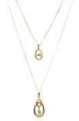 14ct gold diamond pendant necklace and a smaller 9ct gold diamond pendant necklace