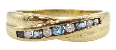 9ct gold channel set round blue topaz and diamond crossover ring