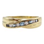9ct gold channel set round blue topaz and diamond crossover ring