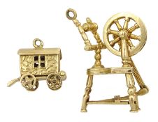 Gold spinning wheel charm and a gold gypsy caravan charm