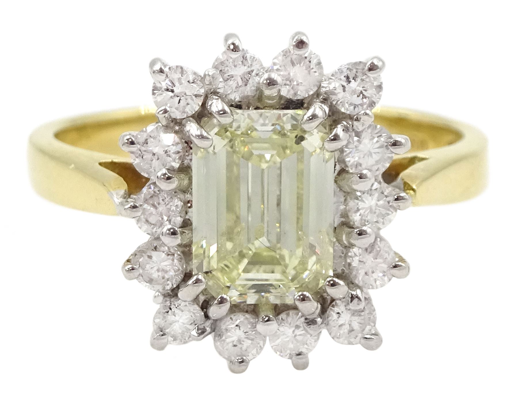 18ct gold emerald cut fancy yellow diamond and round brilliant cut diamond cluster ring