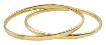 Two 9ct gold bangles