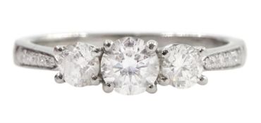 Platinum three stone round brilliant cut diamond ring