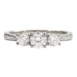 Platinum three stone round brilliant cut diamond ring